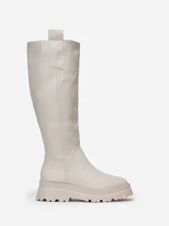 New La Modeuse Bottes  crantées avec larges languettes Beige