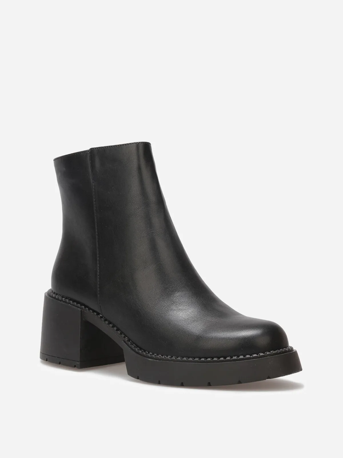 New La Modeuse Bottines à talon et semelle crantés Noir