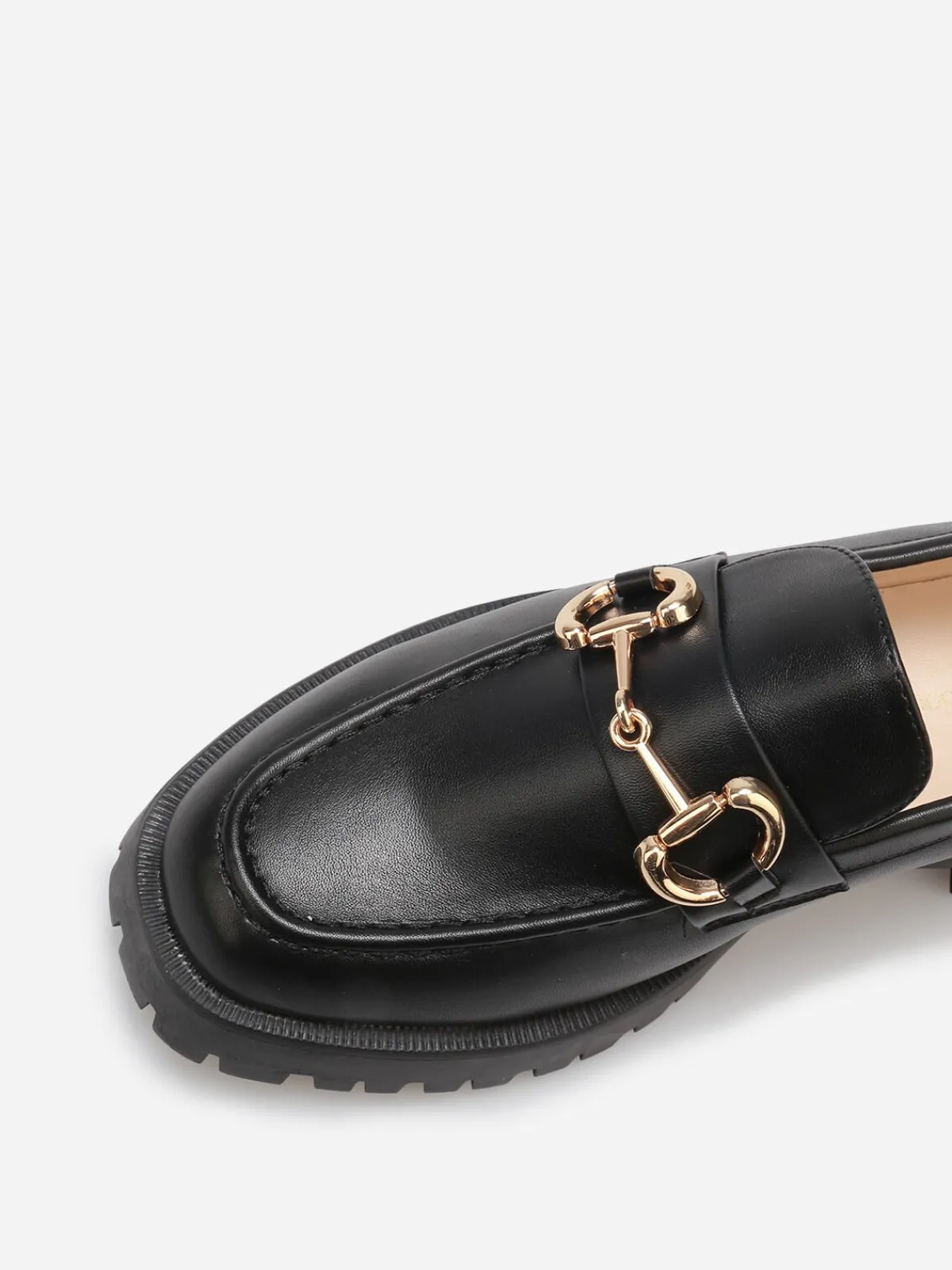 Sale La Modeuse Mocassins à semelle crantée et mors doré Noir