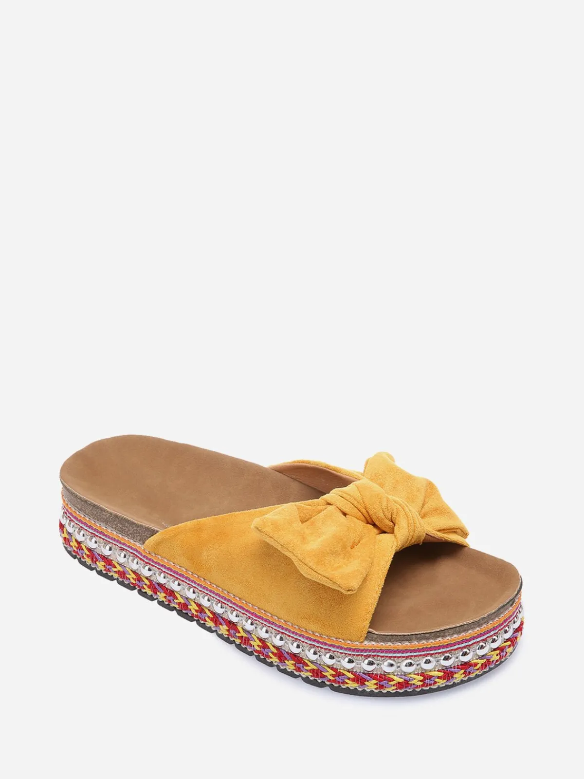 New La Modeuse Mules à noeud et semelle à motifs Jaune