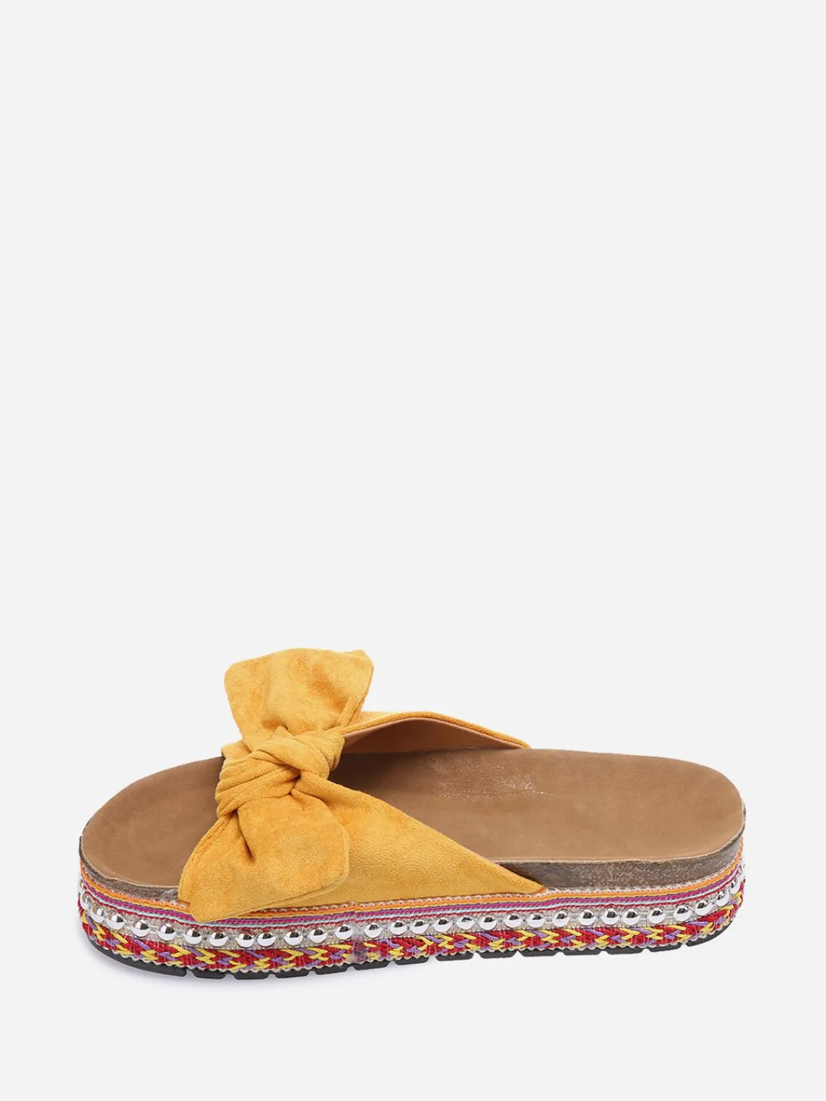 New La Modeuse Mules à noeud et semelle à motifs Jaune
