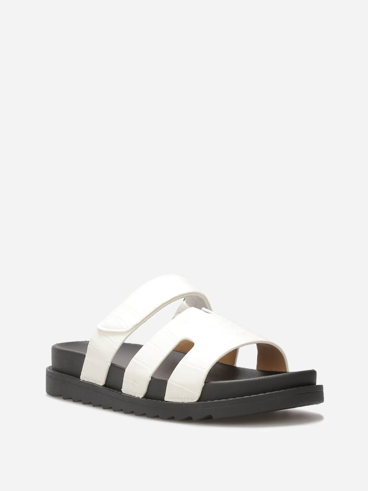 New La Modeuse Mules effet croco à brides ajourées Blanc