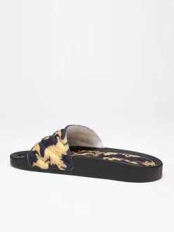 New La Modeuse Mules matelassées à imprimé baroque Noir