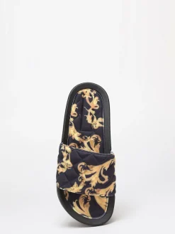 New La Modeuse Mules matelassées à imprimé baroque Noir