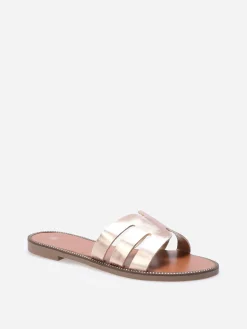 La Modeuse Mules plates à bride ajourée et clous Dorérose