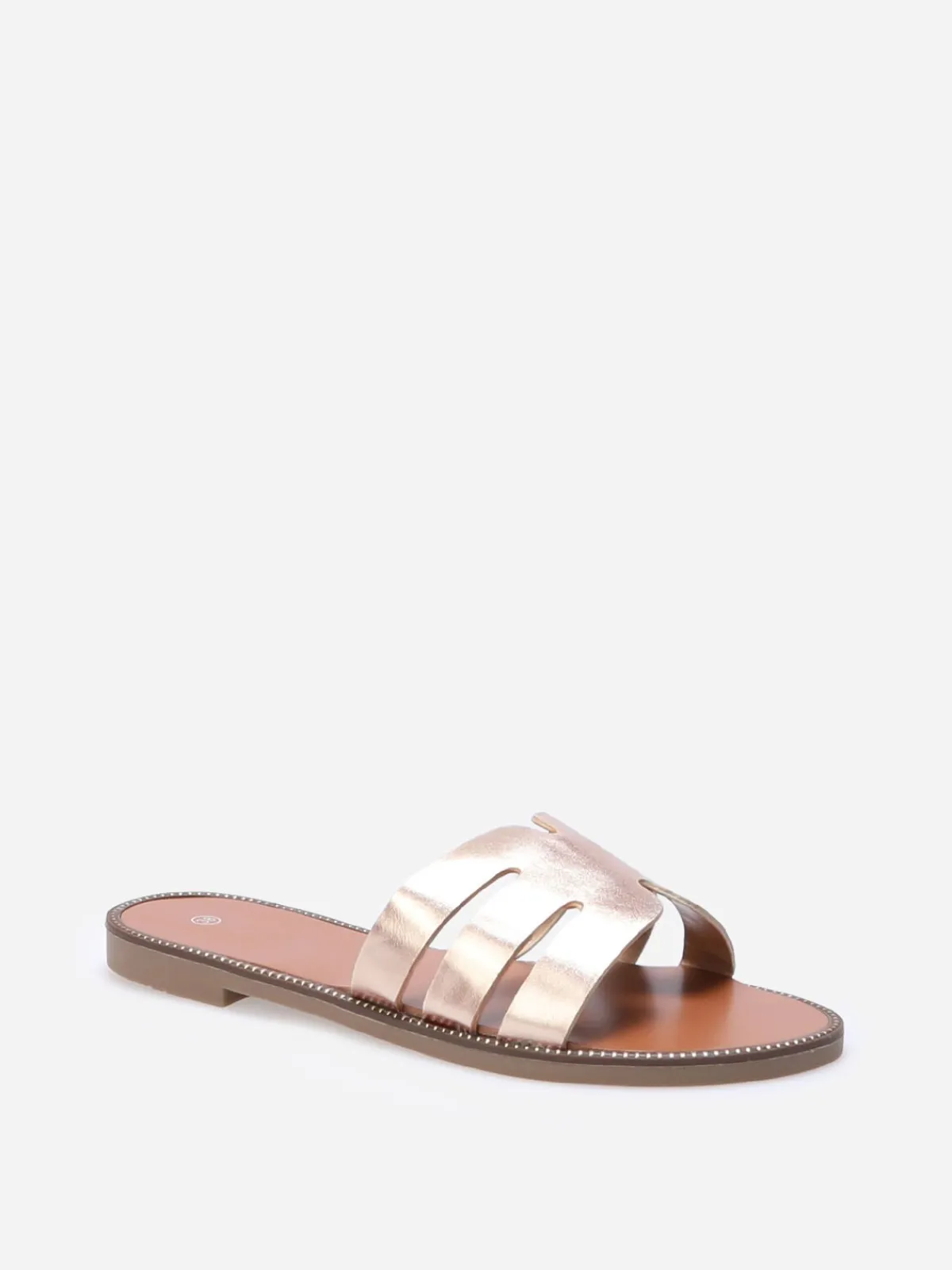 La Modeuse Mules plates à bride ajourée et clous Dorérose