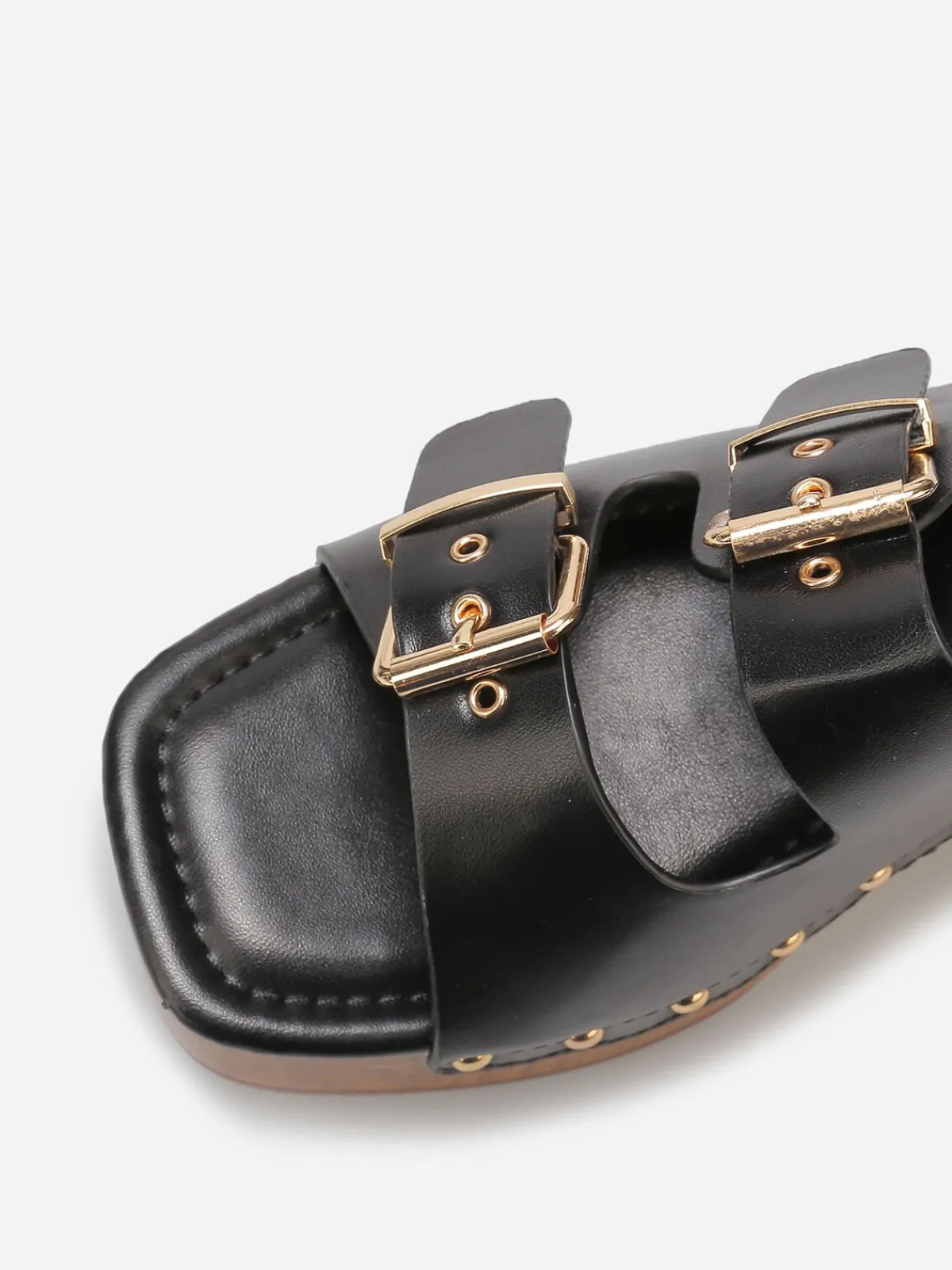 La Modeuse Mules sabots à boucles et clous Noir
