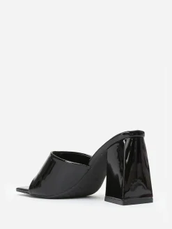 Hot La Modeuse Mules vernies à talon en triangle Noir