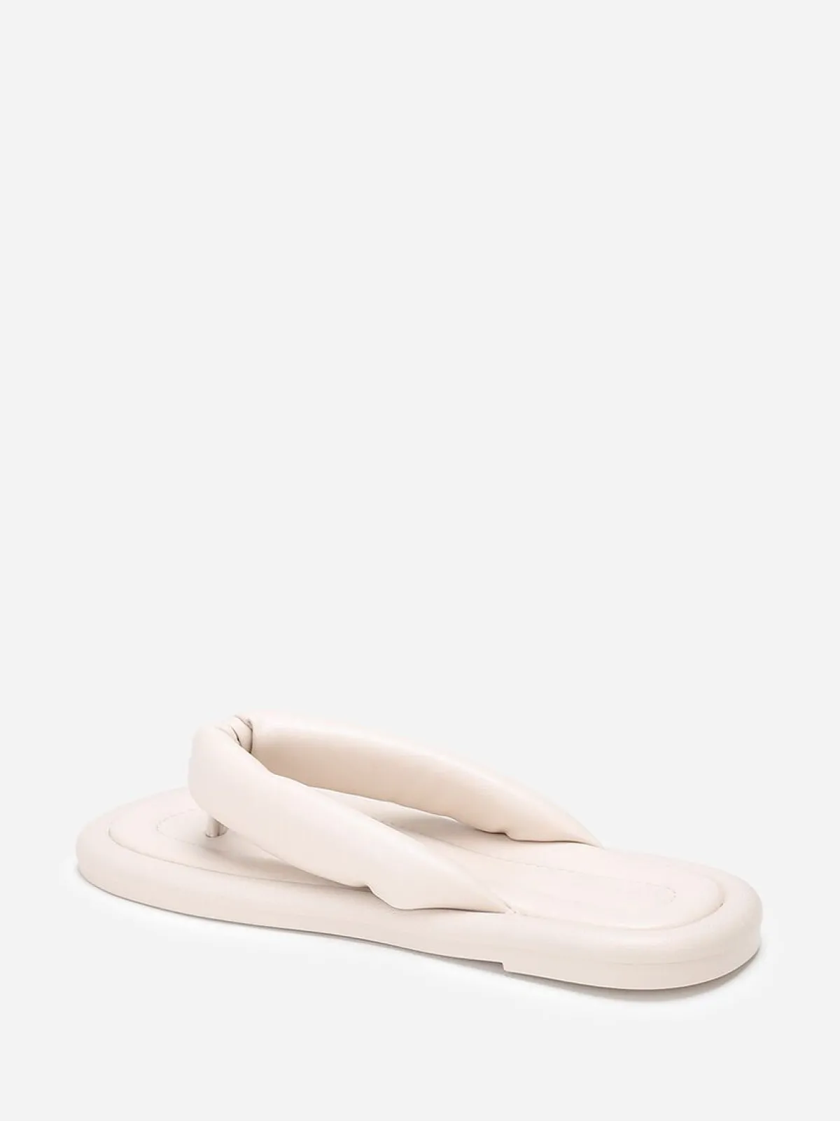 Sale La Modeuse Tongs en simili à bride arrondie et matelassée Beige